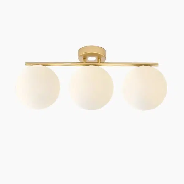 Plafonnier LED contemporain à trois globes de verre sur armature dorée