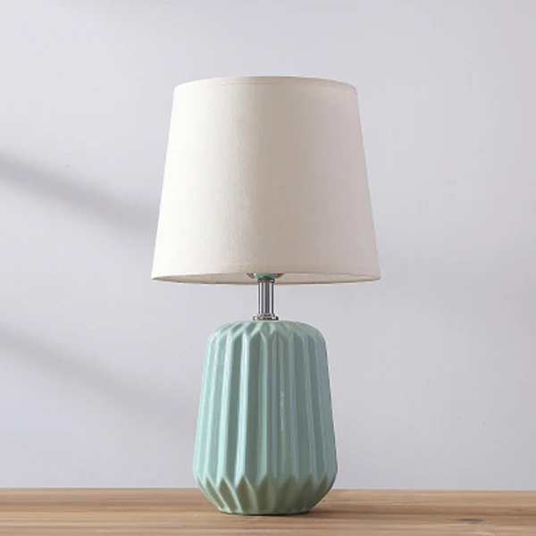 Lampe à poser douce et moderne en céramique