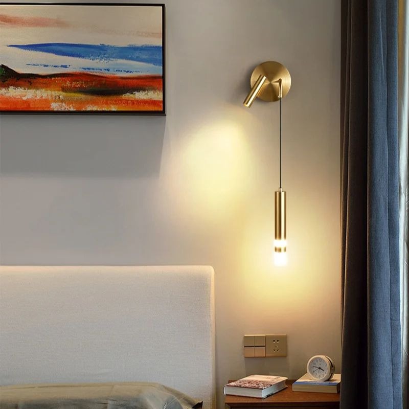 Applique murale orientable dorée minimaliste